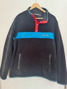 Cotopaxi women’s Black Fleece Pullover with Blue Stripe XL